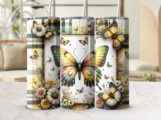 Tall tumbler with a large monarch butterfly and floral plaid design.