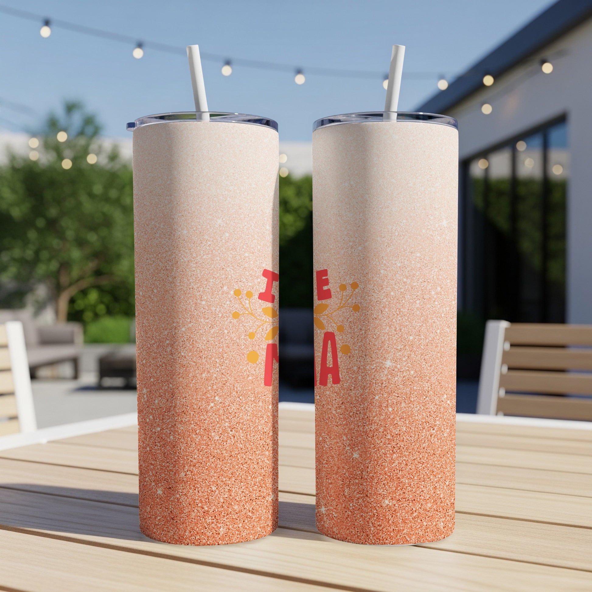 Two glittery tumblers with "Mama" text and floral design.