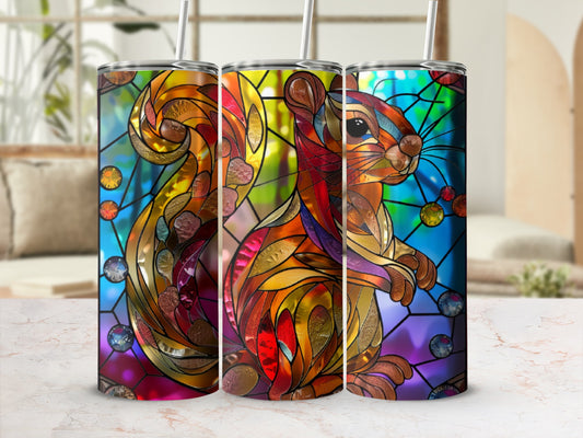 Stained glass squirrel tumbler with colorful mosaic background.