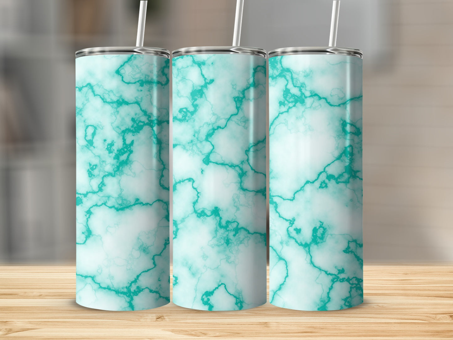 Three tall tumblers with teal and white marble pattern.