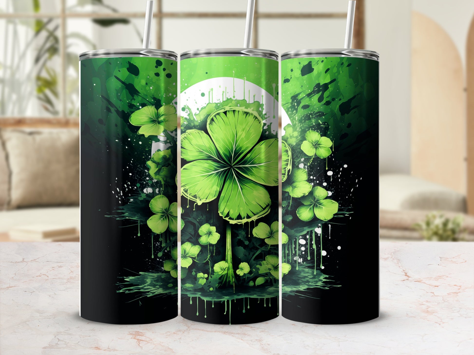 Four-leaf clover tumbler with green splatter design.