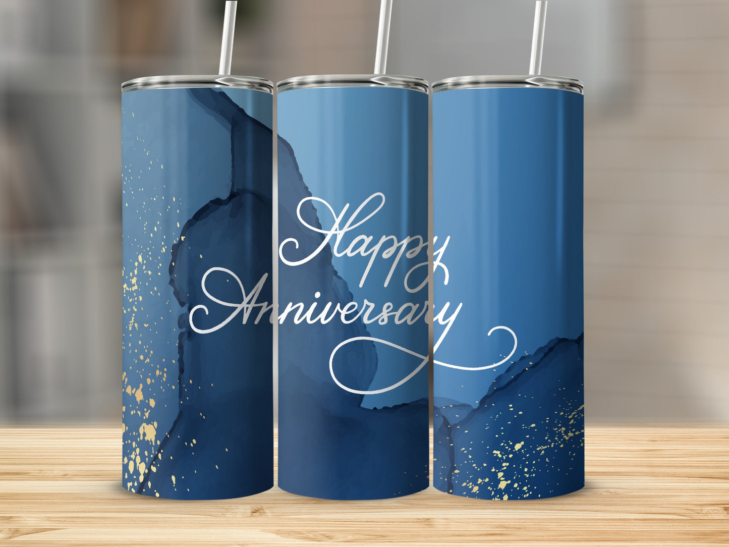 Blue watercolor tumbler with gold accents and "Happy Anniversary" text.