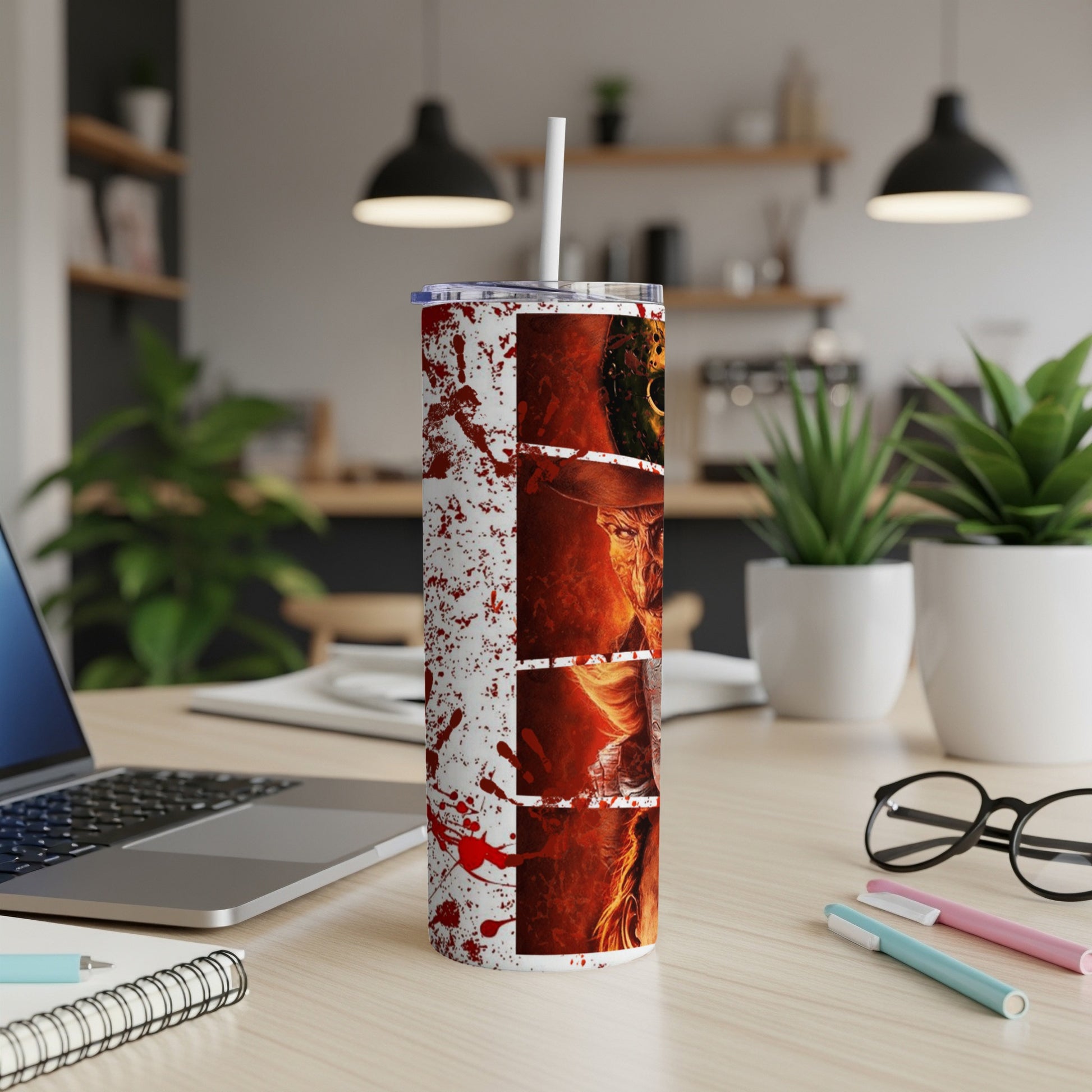 Tall tumbler with a horror-themed design featuring blood splatters and a scary face.