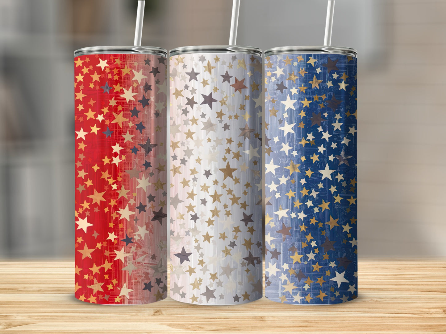 Three tumblers with patriotic star patterns in red, white, and blue.
