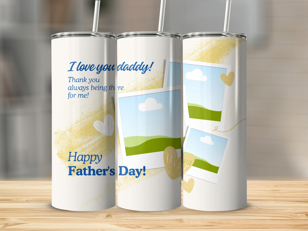 White tumbler with "I love you daddy!" and "Happy Father's Day!" text, photo frames.