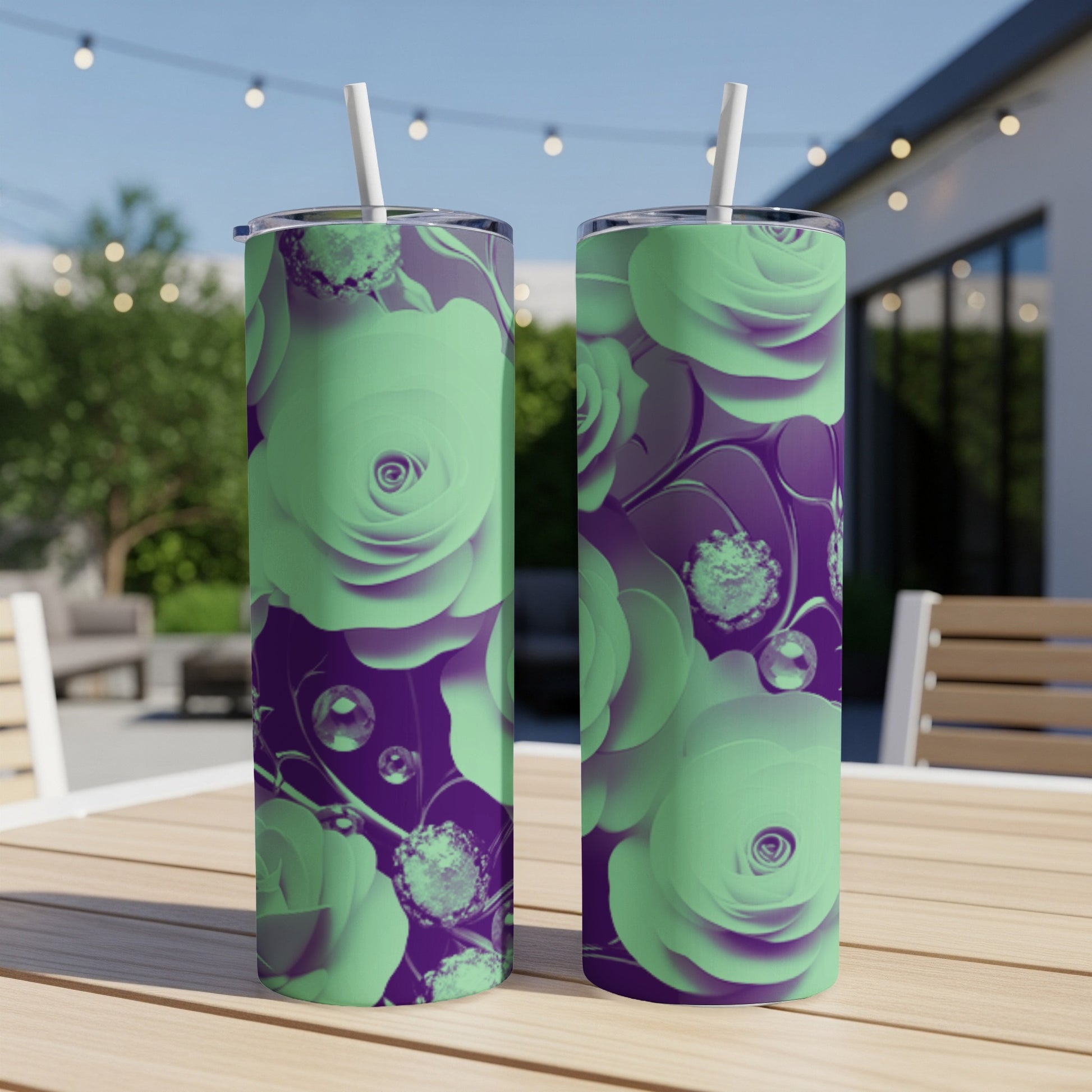 Two purple tumblers with mint green rose and bubble pattern.