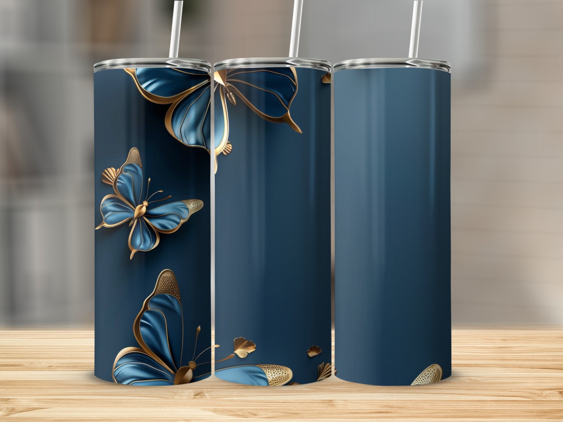 Dark blue tumbler with golden butterflies and floral accents.