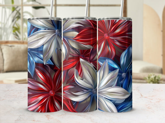 Three tumblers with patriotic red, white, and blue floral designs.