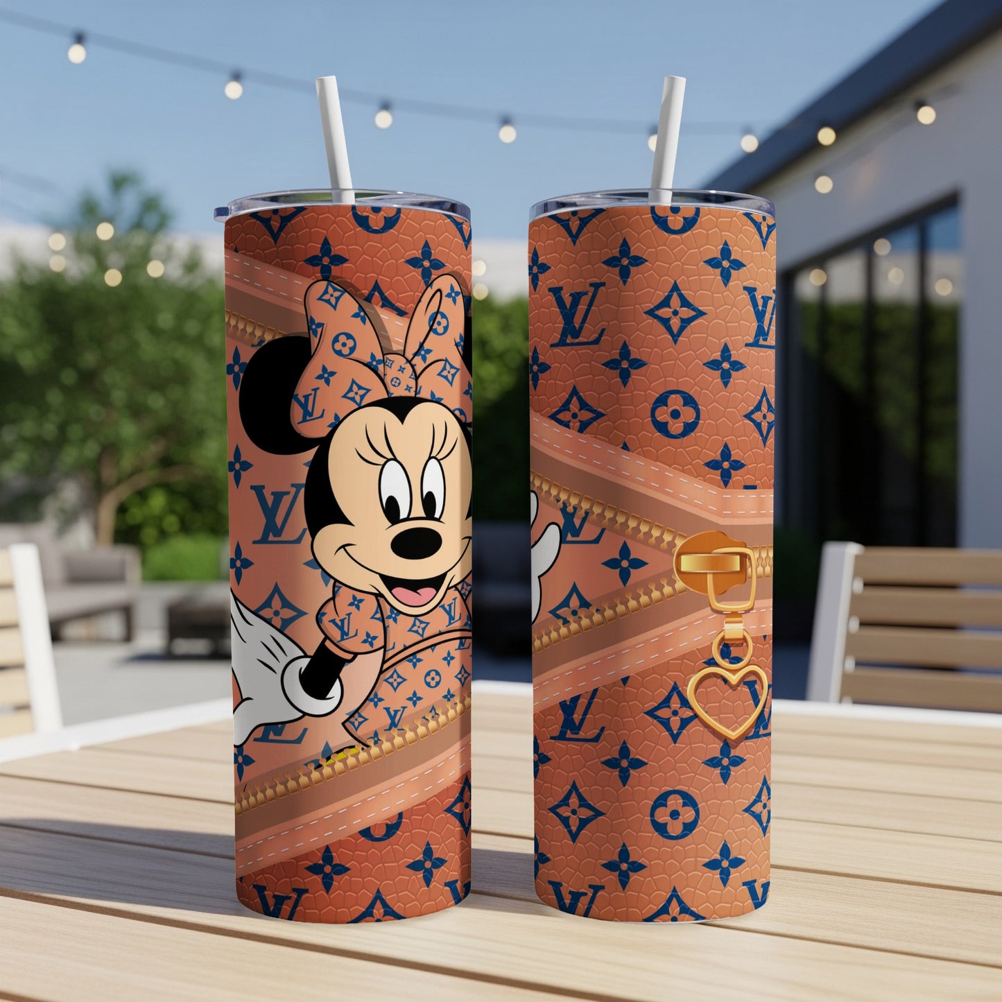 Minnie Mouse wearing bow and LV print on brown patterned tumbler.