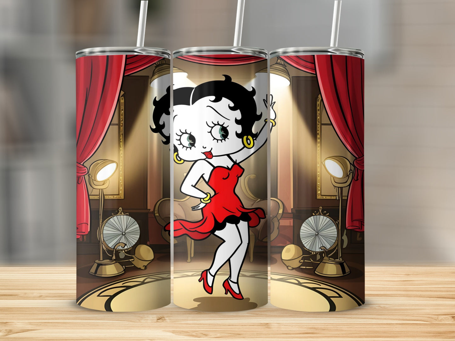 Betty Boop in a red dress on a stage, with spotlights and fans.