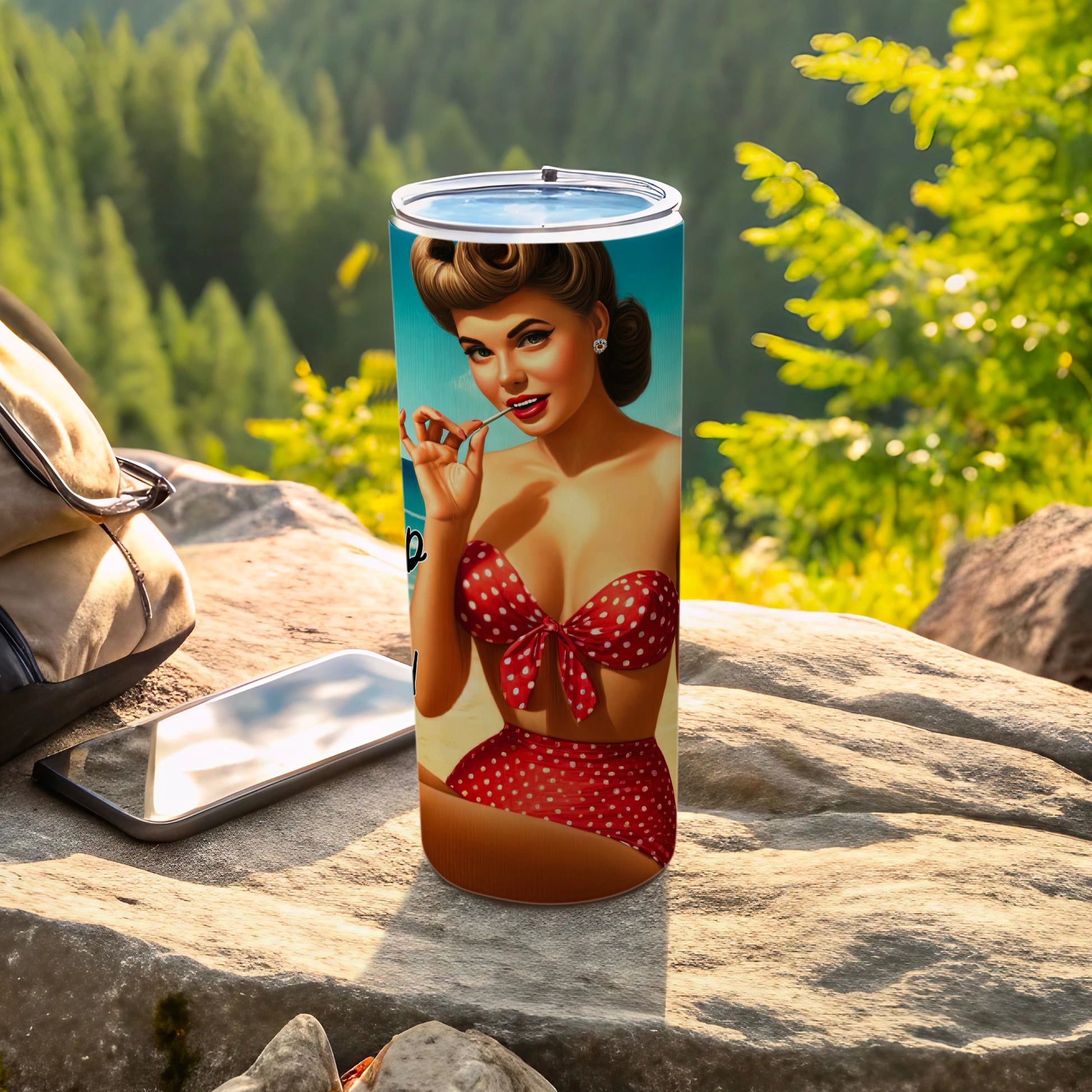 Pin-up girl in red polka dot bikini holding a lollipop on a tumbler.