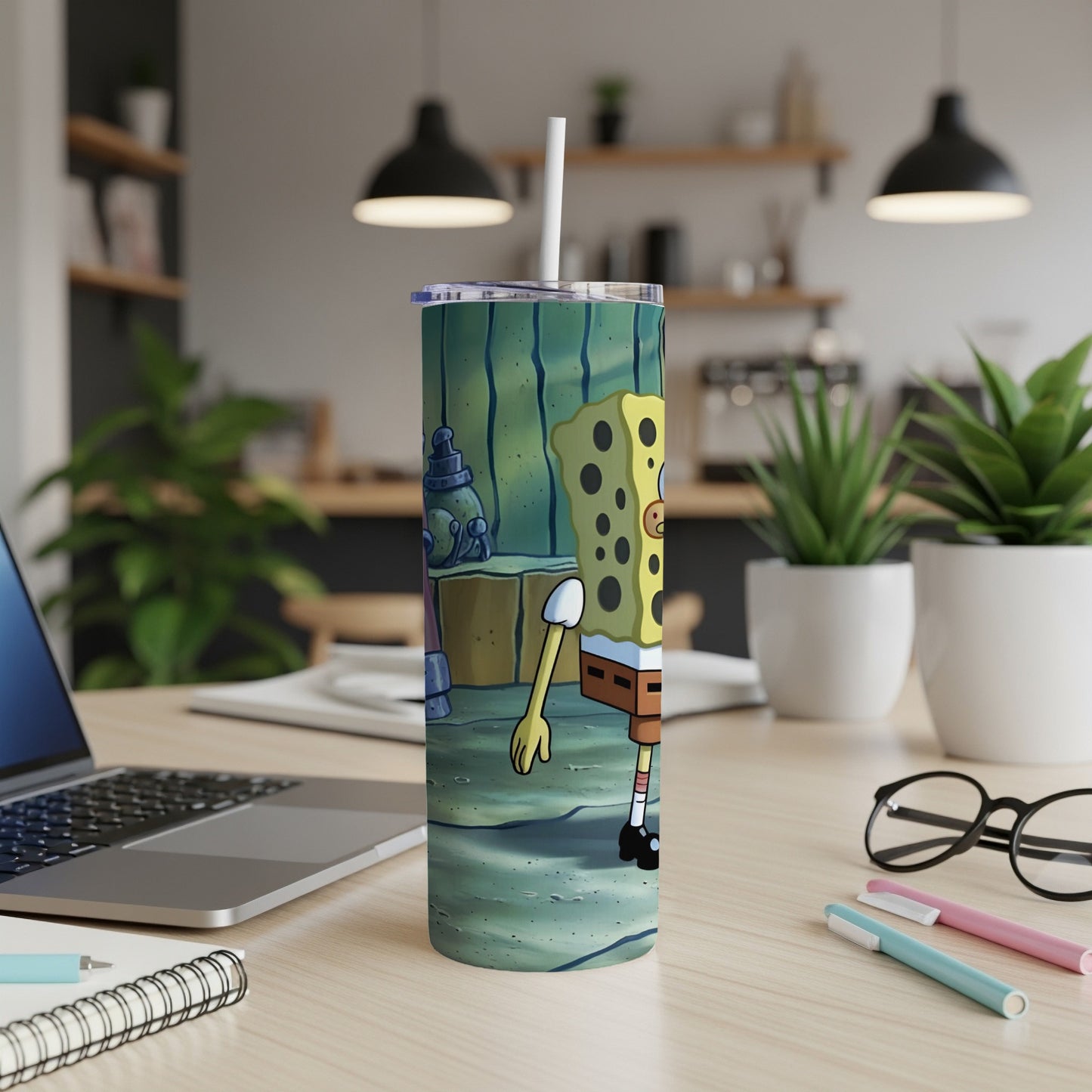 SpongeBob SquarePants character on a tumbler, with a kitchen counter background.