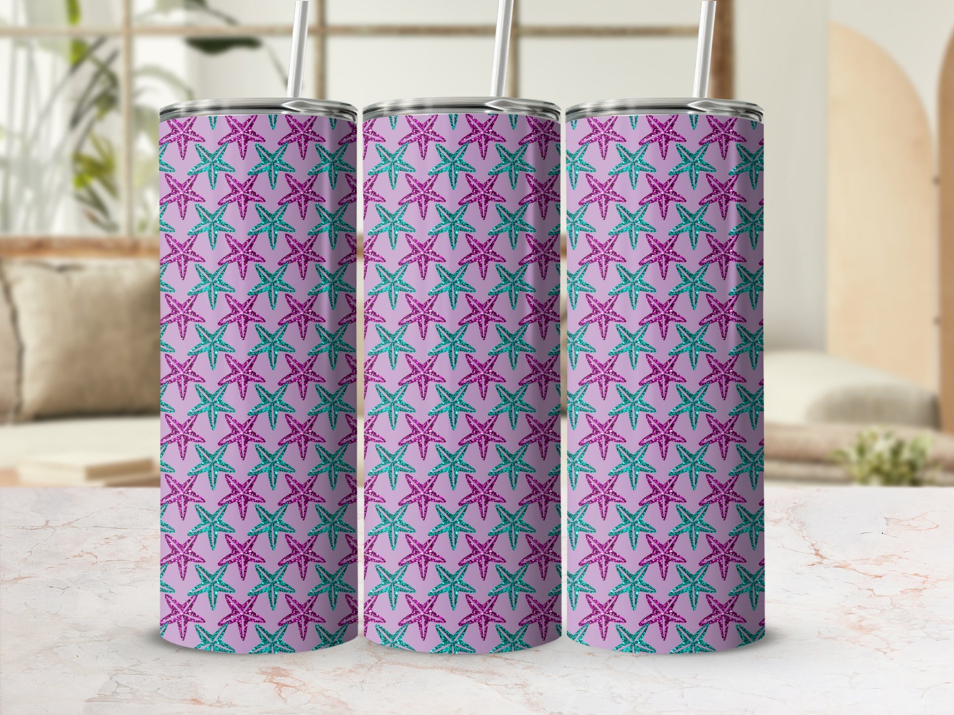 Three tumblers with a repeating pattern of pink and teal starfish.