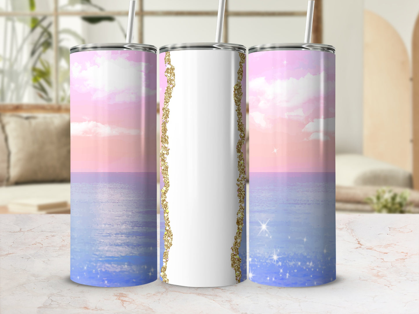 White tumbler with pink and blue sky gradient and gold glitter detail.