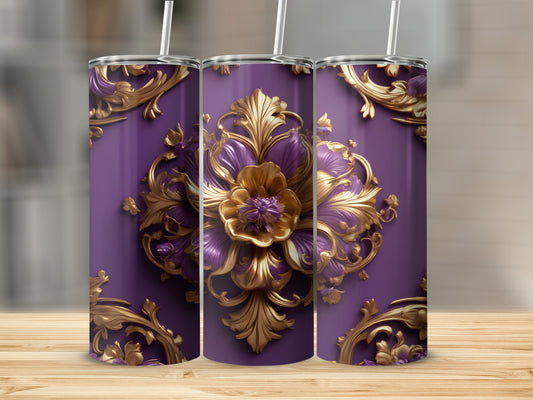 Purple tumbler with ornate gold floral design and straw.