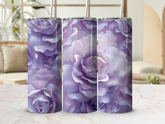 Three purple rose-patterned tumblers with straws.