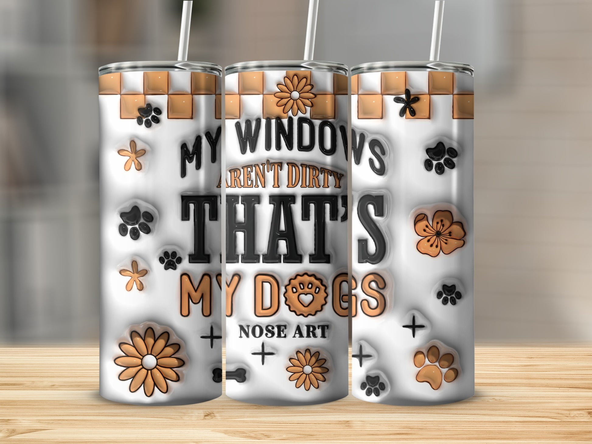 Three tumblers with floral and paw print patterns, and "My windows aren't dirty, that's my dogs" text.