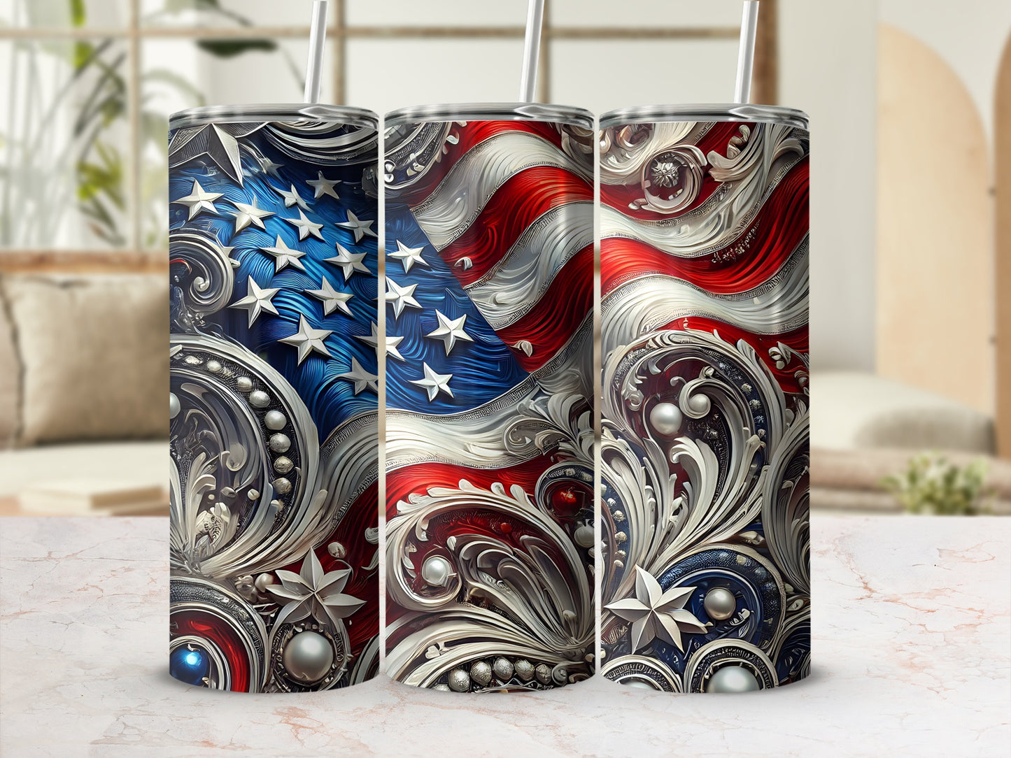 Three patriotic tumblers with American flag and ornate silver designs.