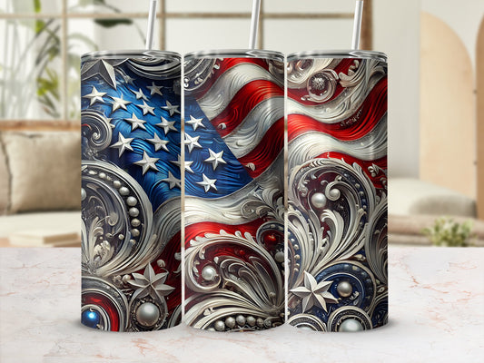 Three patriotic tumblers with American flag and ornate silver designs.