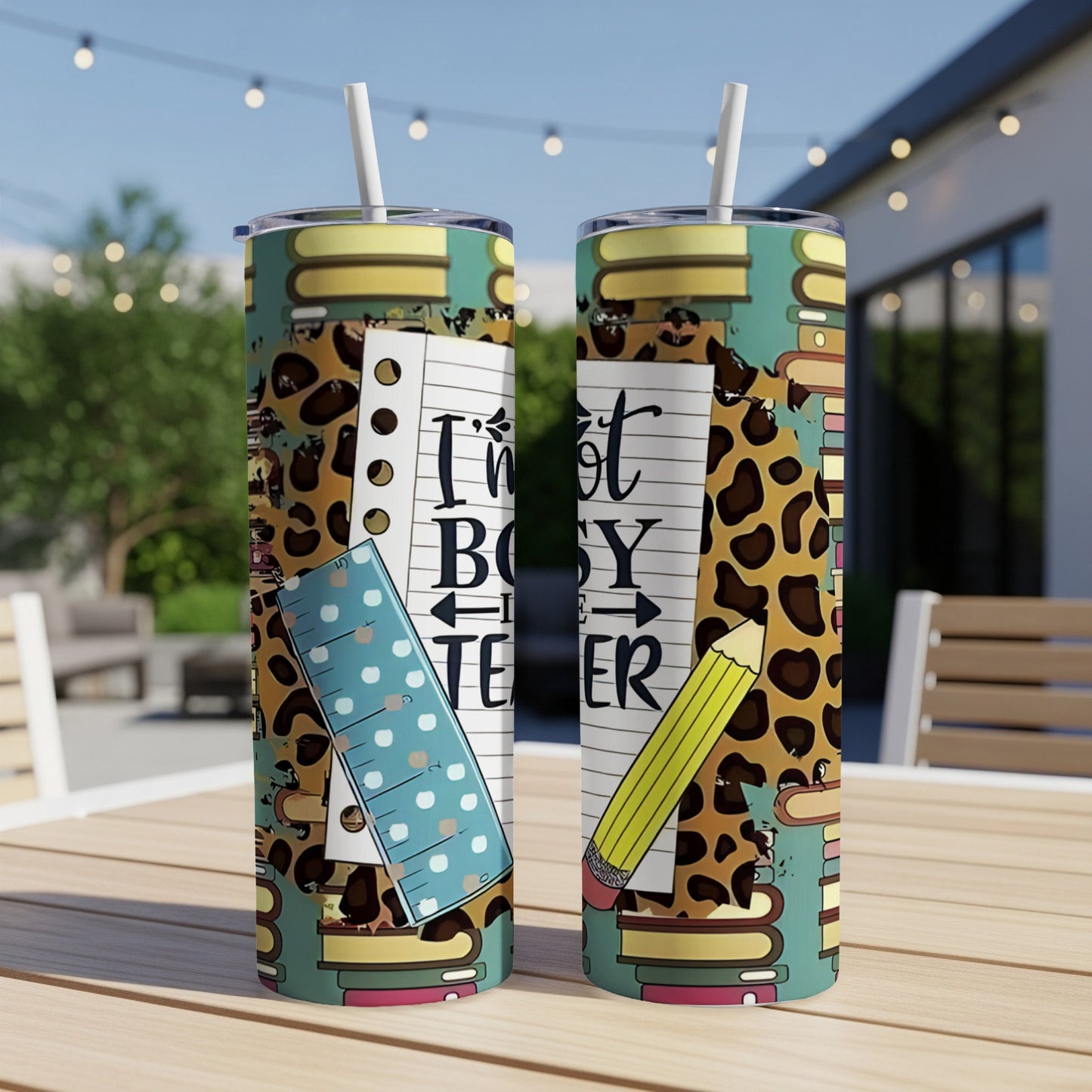 Two tumblers with leopard print and school supplies pattern, reading "I'm not busy, teacher".