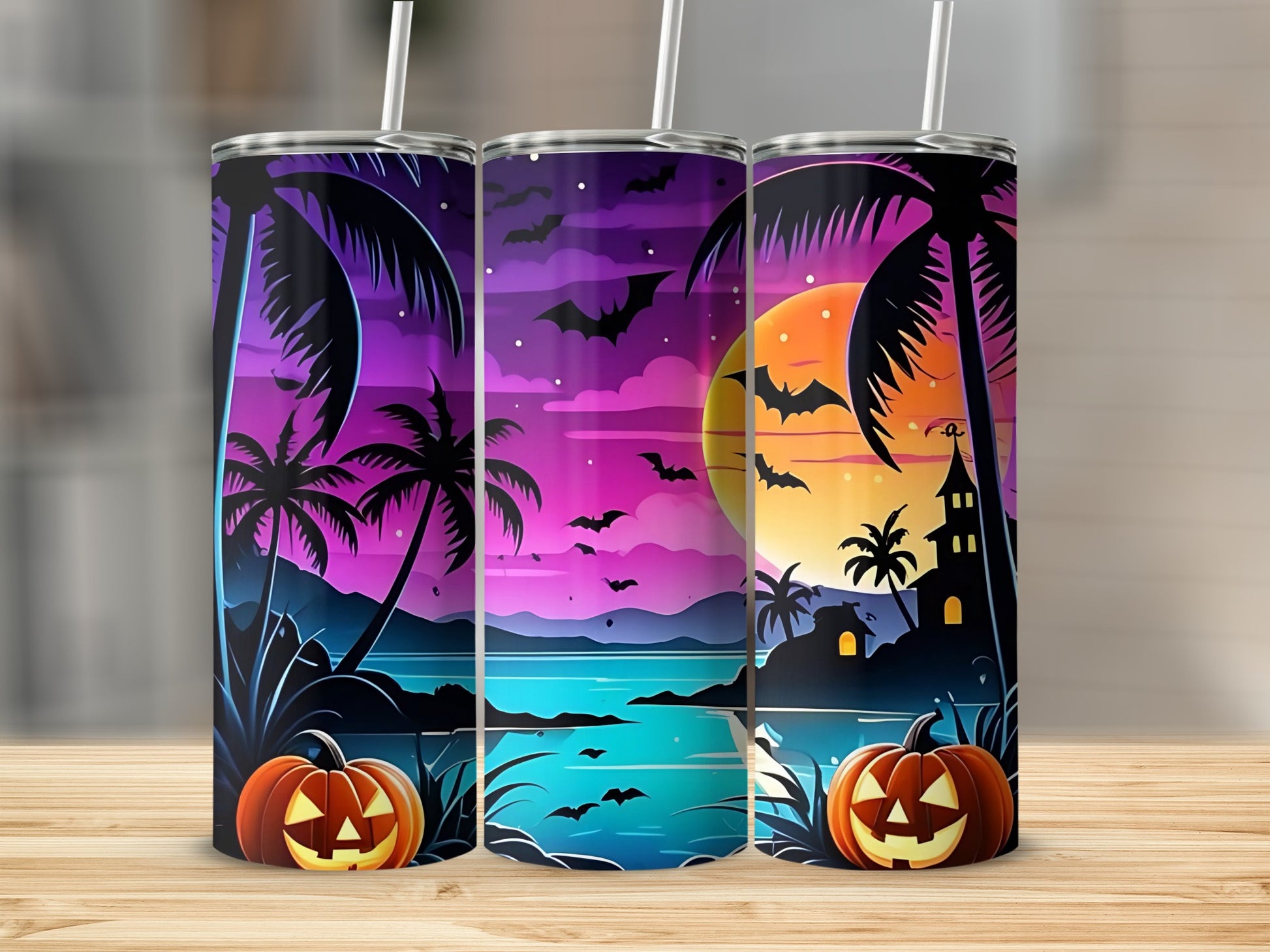 Three tumblers with a Halloween tropical beach scene and pumpkins.