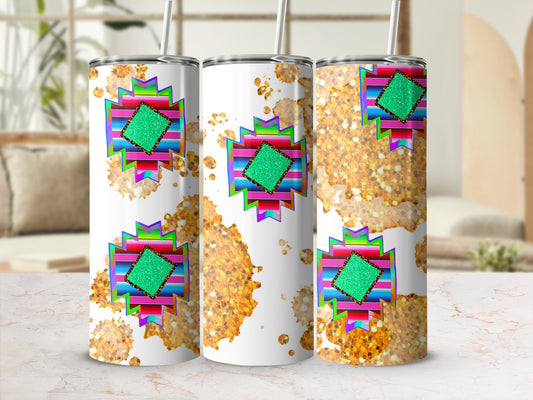 White tumbler with Aztec design and glitter accents.