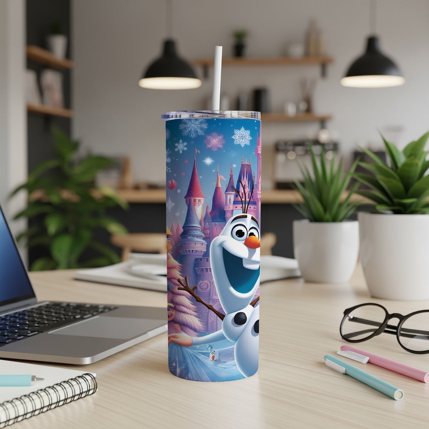 Olaf from Frozen on a blue tumbler with a castle and snowflakes.