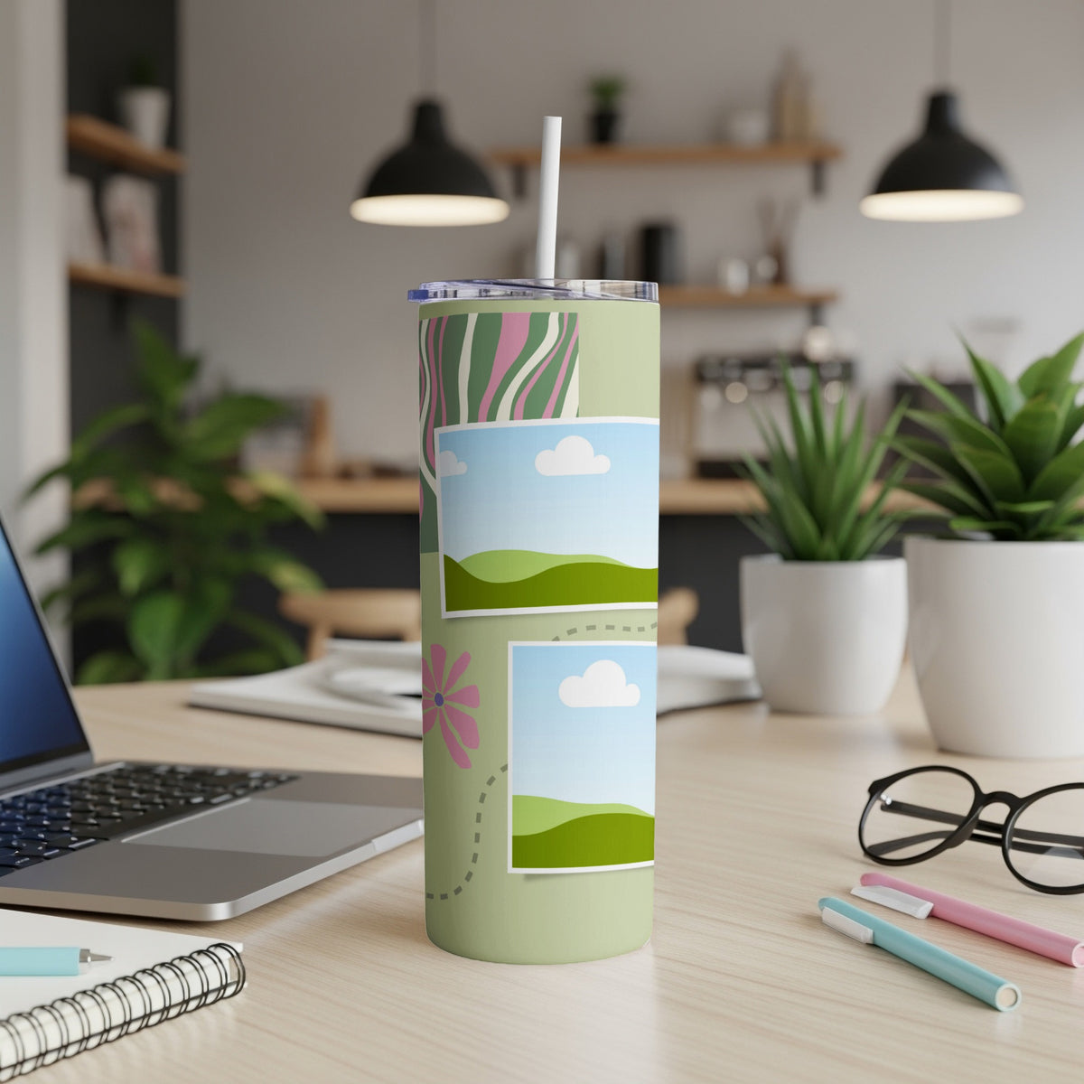 Green tumbler with abstract wavy lines, photo frames, and a flower design.
