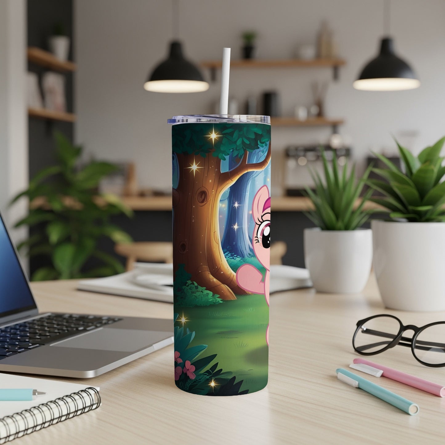 Pink cartoon pony with stars in a forest scene on a tumbler.