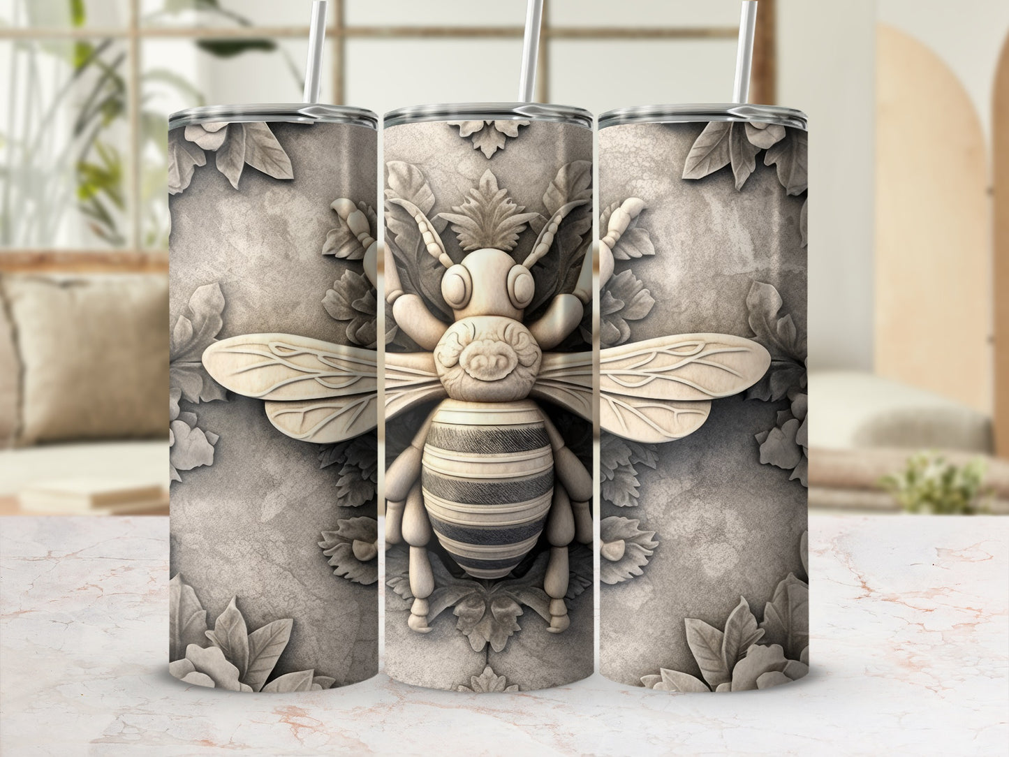 Textured tumbler with ornate bee and floral design, three viewed.