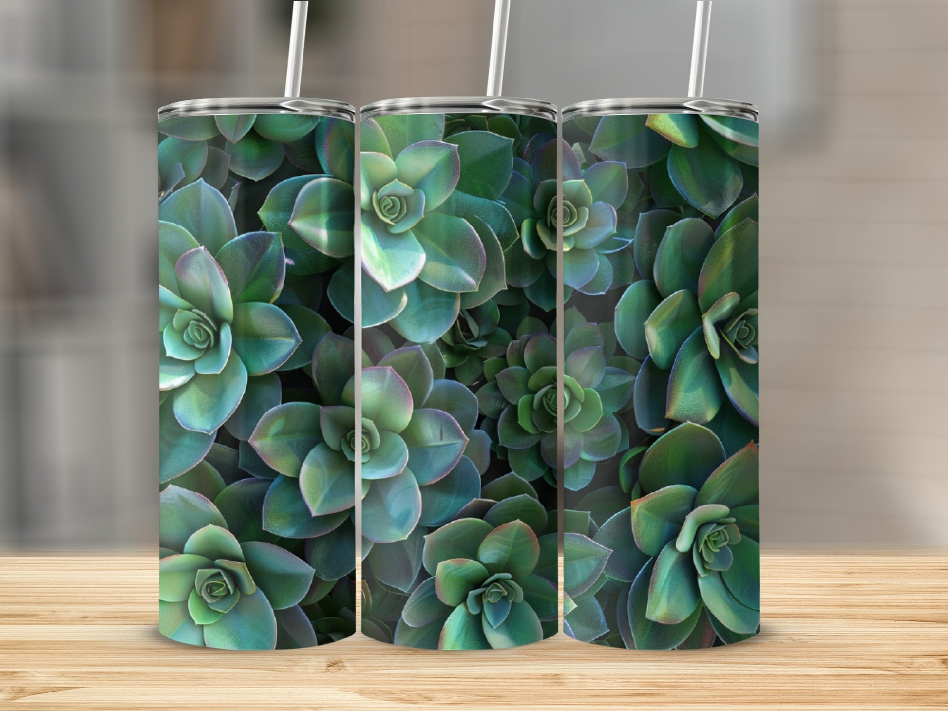 Three tumblers with a green succulent plant pattern.