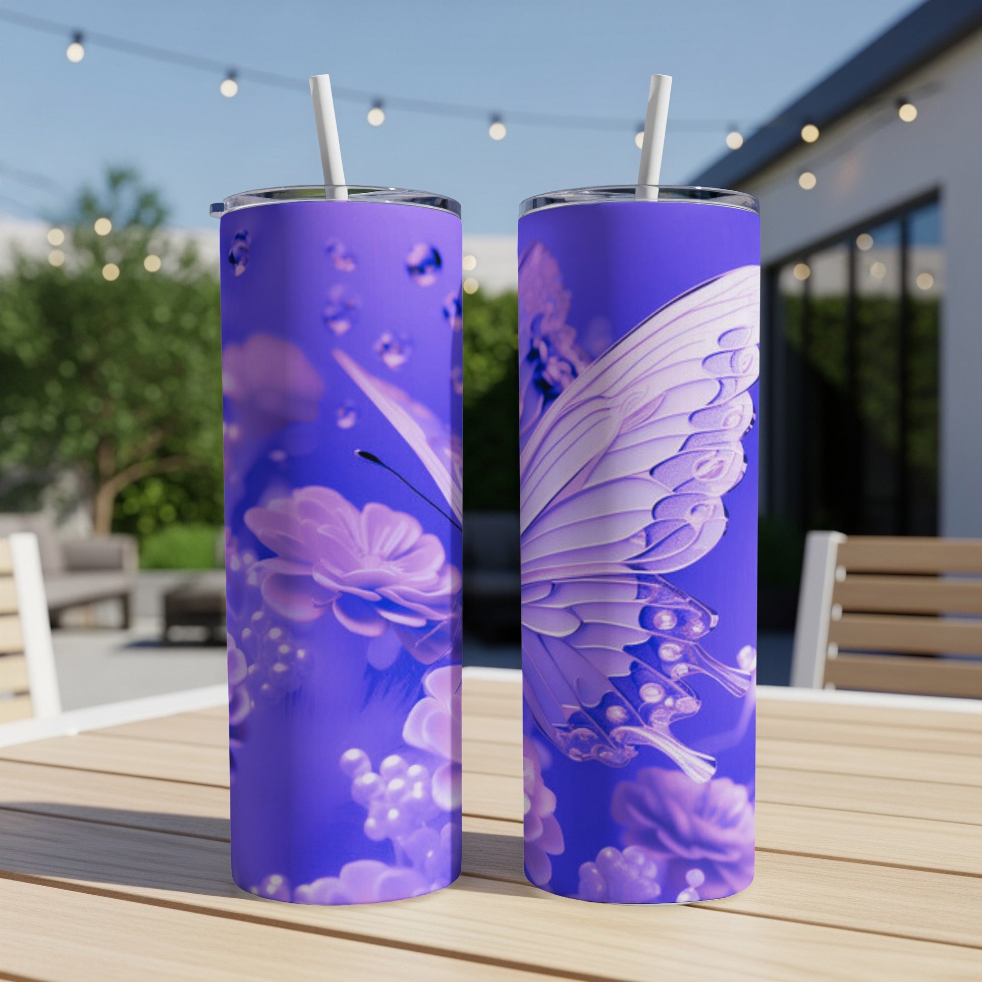Purple tumbler with butterfly and floral design.