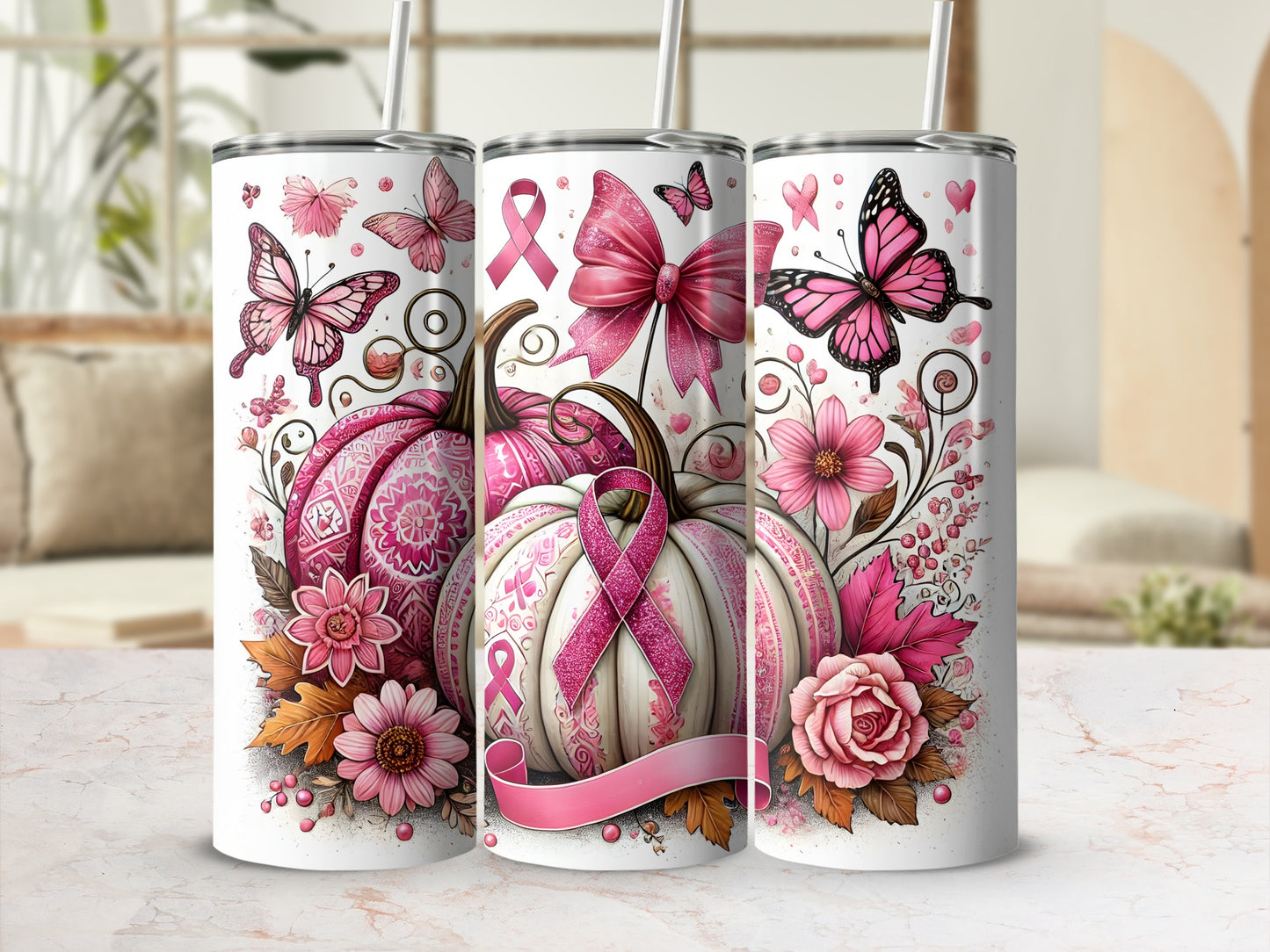 Pink pumpkins and butterflies with breast cancer awareness ribbons on tumblers.
