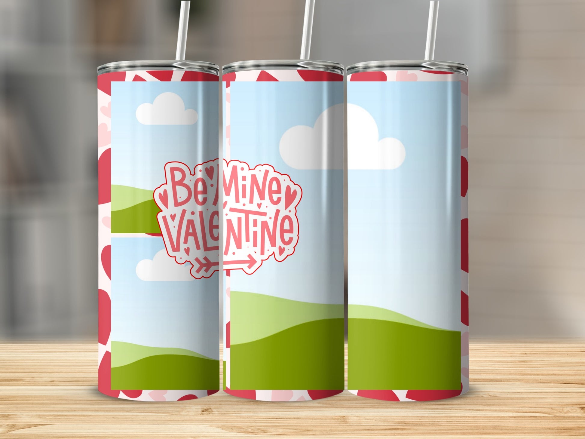 Tumbler with "Be Mine Valentine" text, hearts, clouds, and rolling green hills.