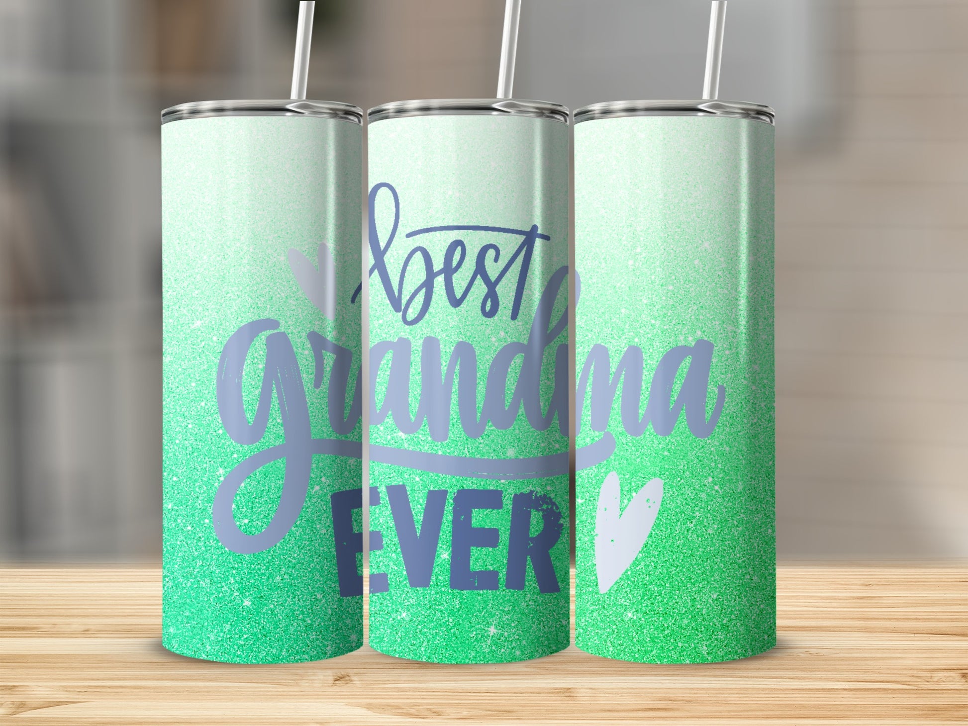 Green glitter tumbler with "best grandma EVER" text.