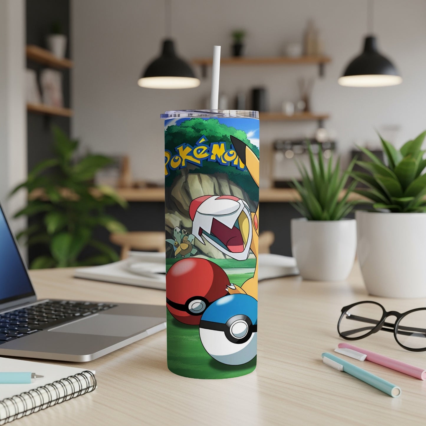 Pokemon characters Pikachu, Charmander, and Squirtle on a tumbler with a kitchen background.
