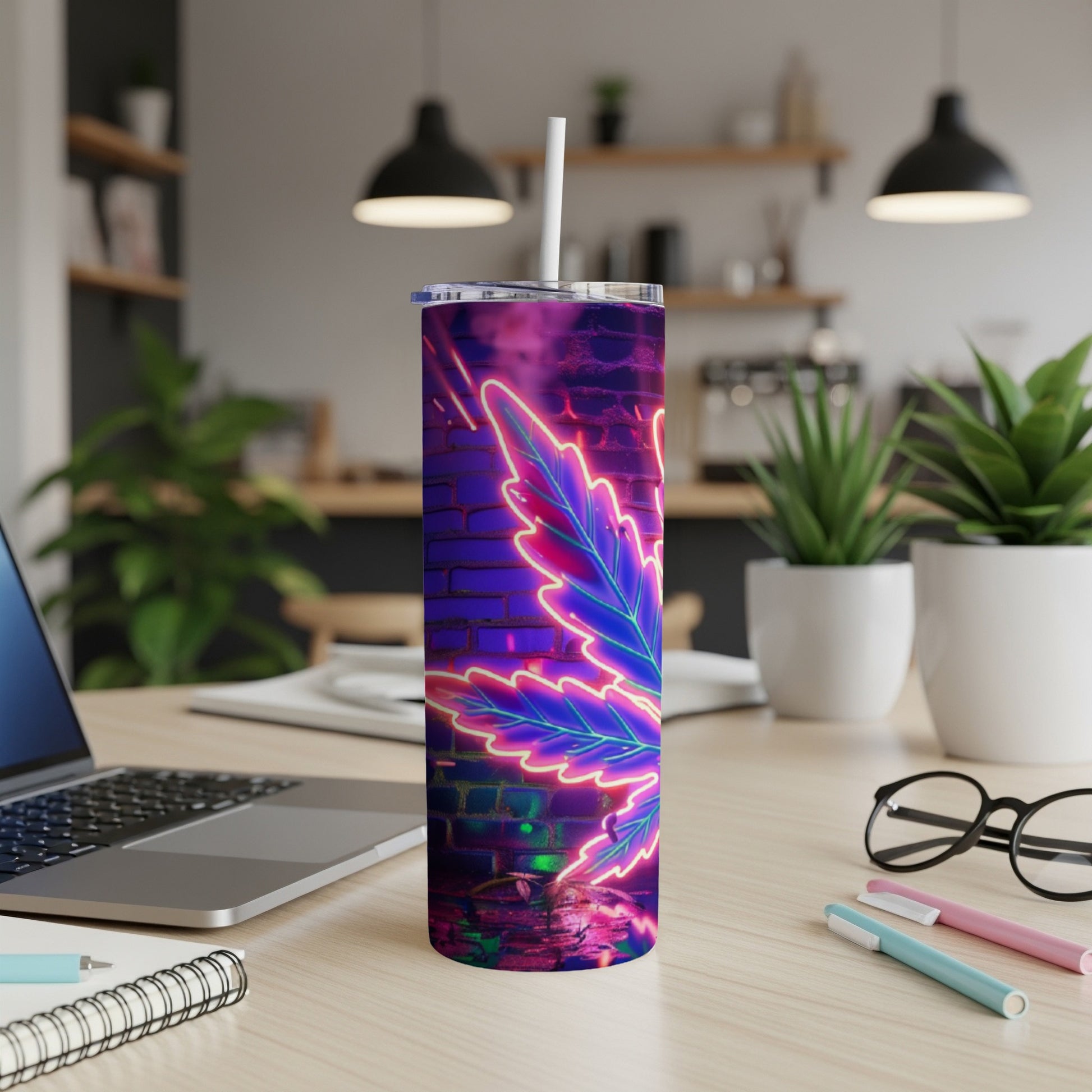 Neon marijuana leaf on a purple brick background on a skinny tumbler.