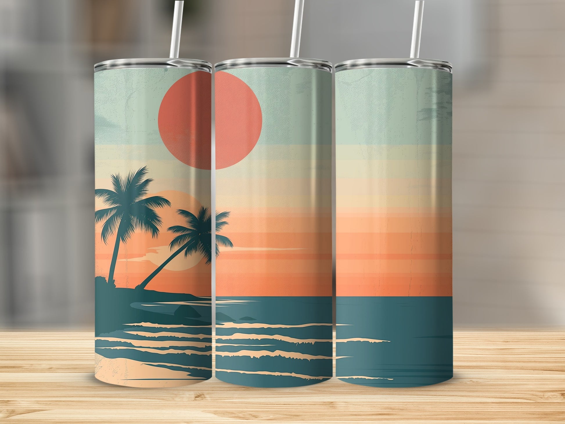 Three tumblers displaying a sunset over the ocean with palm trees.