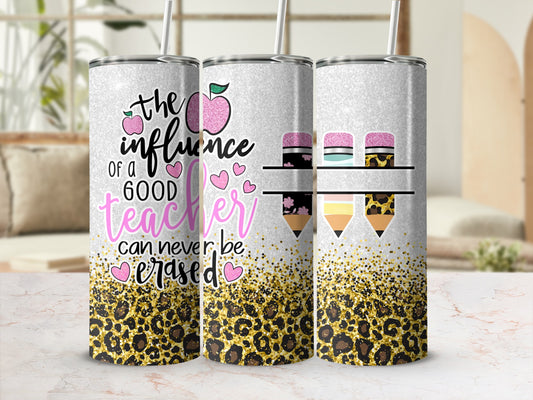 Tumbler with "The influence of a good teacher can never be erased" and apple design.