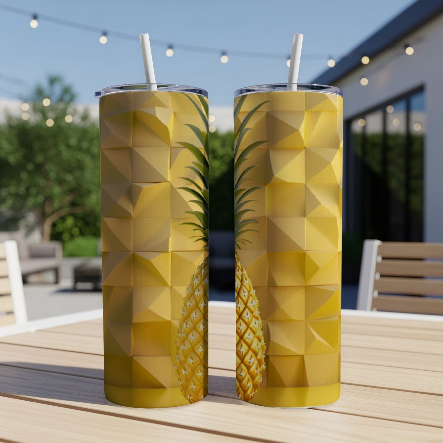 Two tall tumblers with a textured pineapple pattern, sitting on a wooden table.