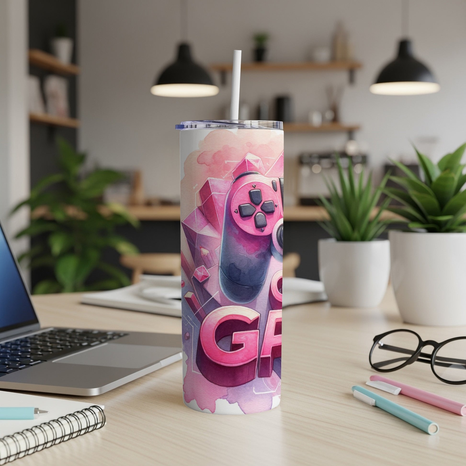 Pink and purple tumbler with "GAMING" text and controller design.