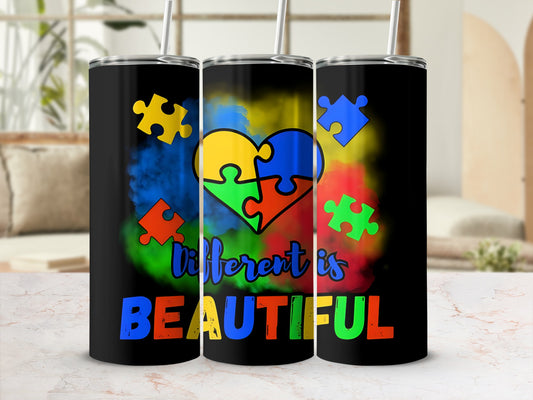 Black tumbler with colorful autism puzzle heart and "Different is BEAUTIFUL" text.