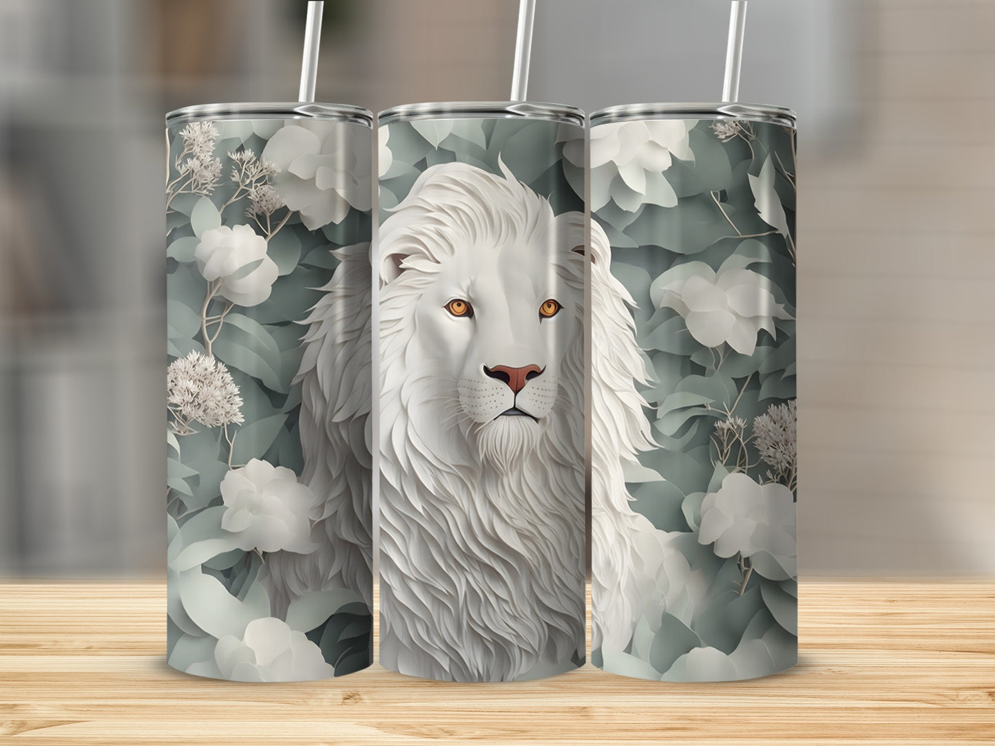 White lion portrait with floral accents on three tumblers.