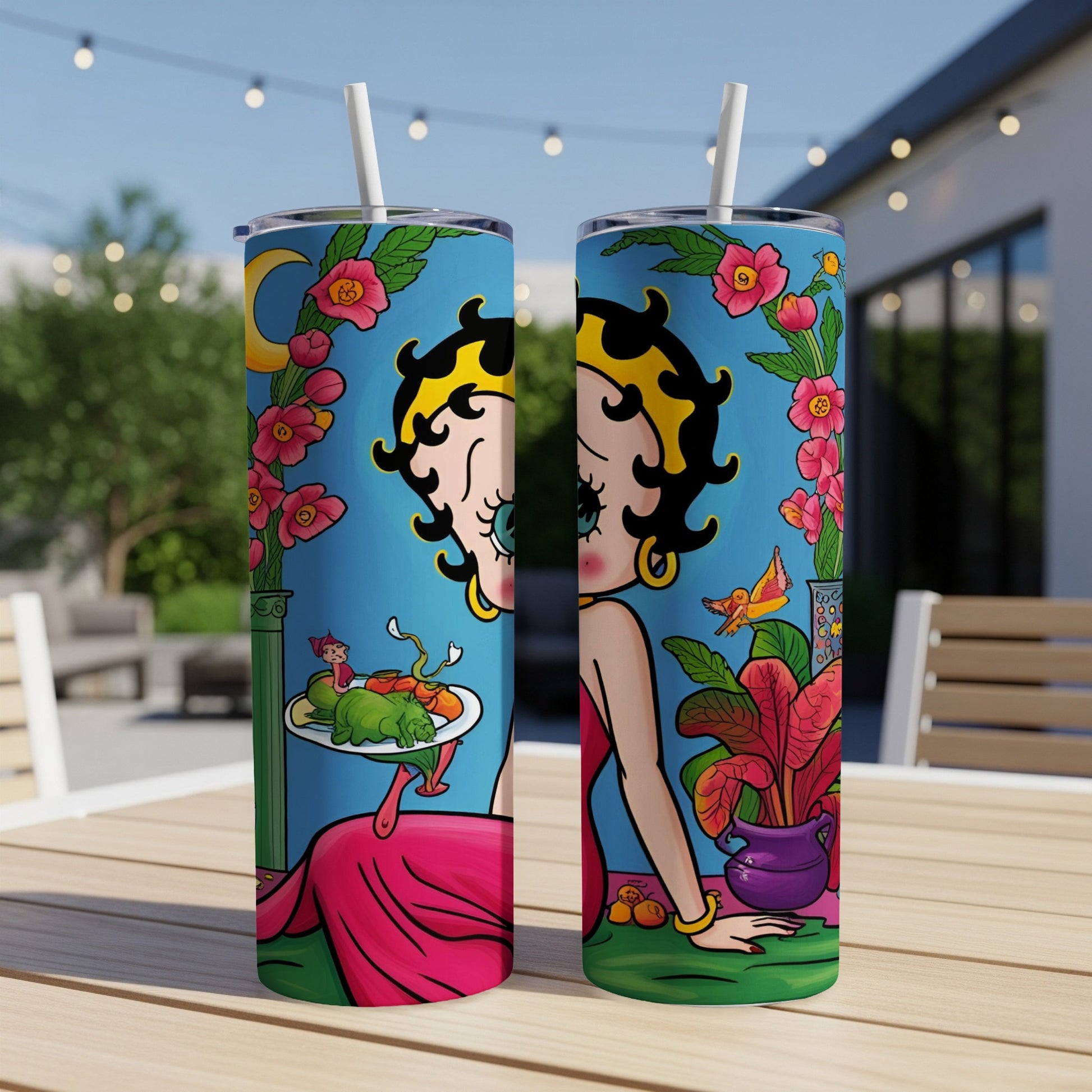Betty Boop illustration on two tumblers surrounded by flowers and a moon.