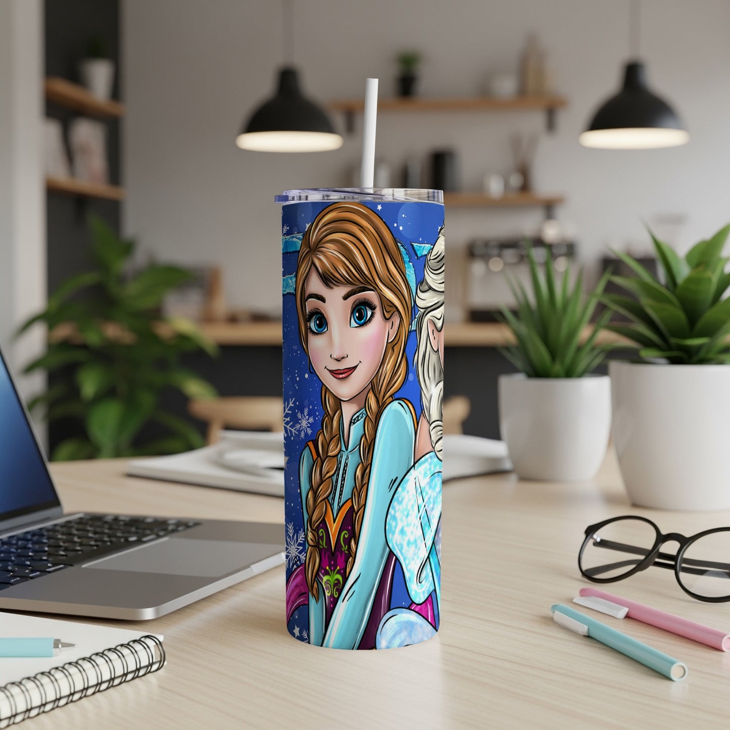 Elsa and Anna from Frozen on a blue tumbler with snowflakes, straw.