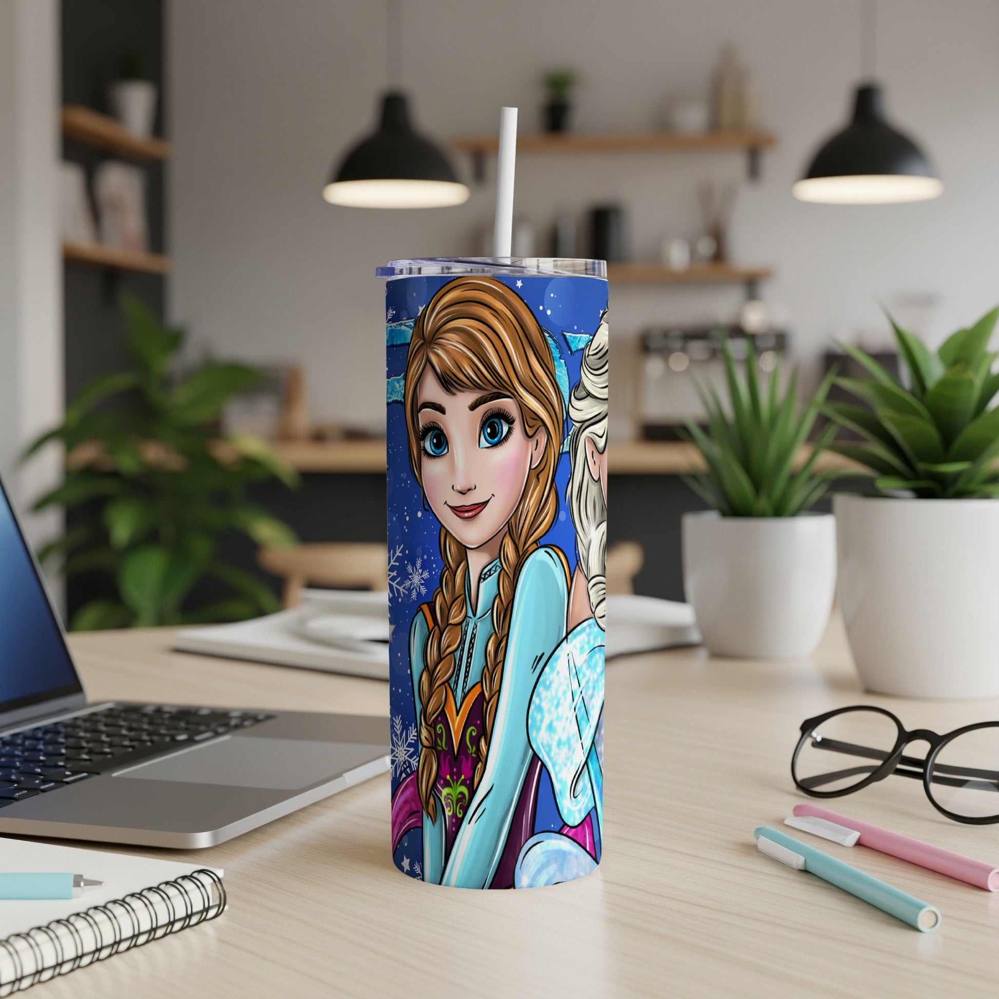 Elsa and Anna from Frozen on a blue tumbler with snowflakes, straw.
