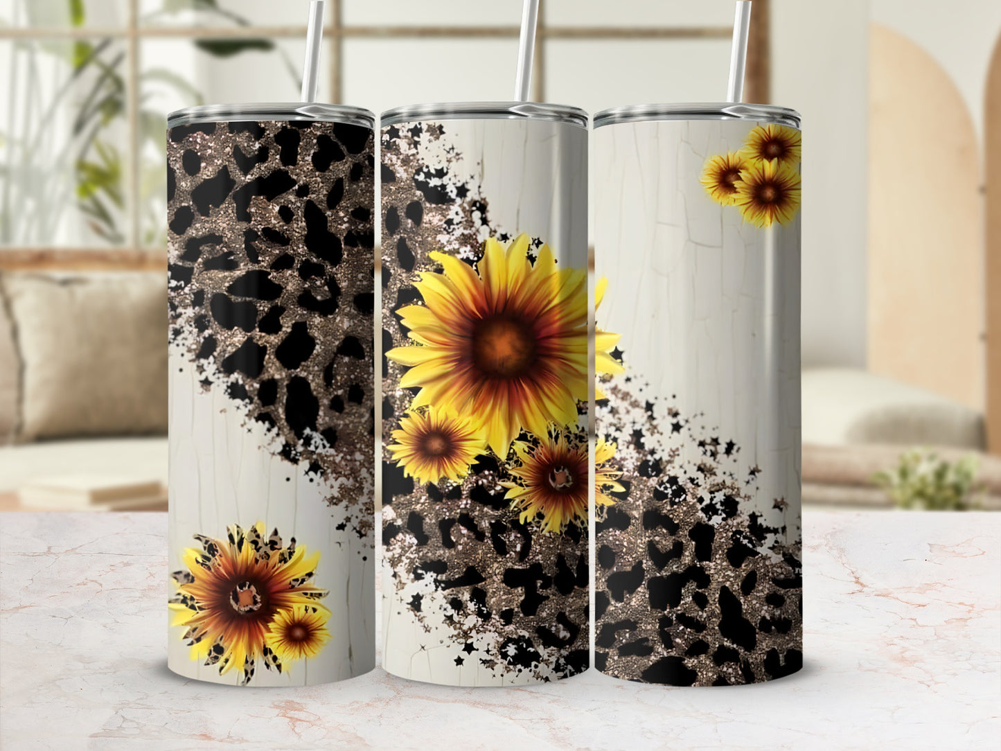 Three tumblers with leopard print and sunflower designs.