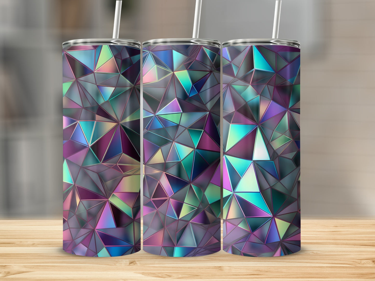 Three tall tumblers with a stained glass geometric pattern on a wooden surface.