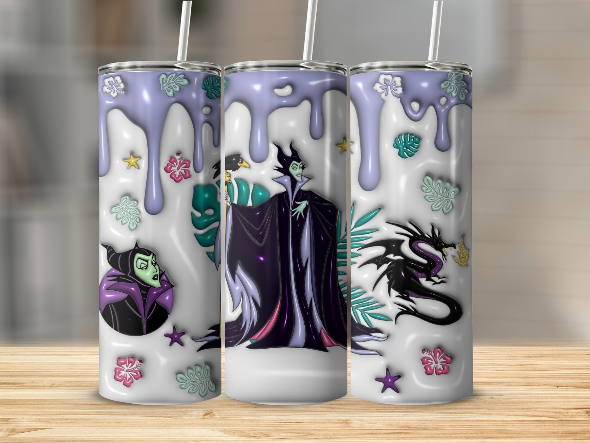 Maleficent and dragon design on three purple and white tumblers with tropical flowers.