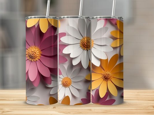 Three floral tumblers with pink, white, and yellow daisy designs.